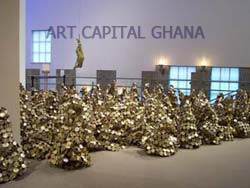 PEAK PROJECT: El Anatsui, Peak milk cans, wire,1999